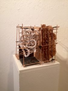 "Turn It Around" by Darlene Boyd. Hand made paper, jute, string, bamboo, copper.